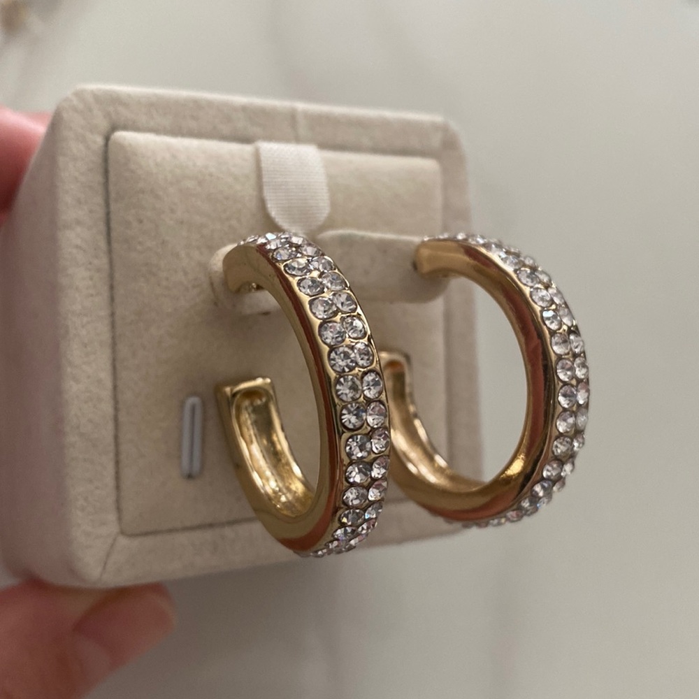Gold tone and rhinestone costume earrings